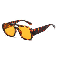 Tortoiseshell frame + orange lens